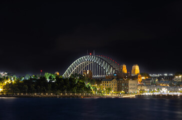 Fototapeta premium Sydney Harbour Bridge New Years Eve fireworks, colourful NYE fire works lighting the night skies with vivid multi colours