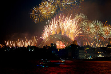 Sydney Harbour Bridge New Years Eve fireworks, colourful NYE fire works lighting the night skies with vivid multi colours