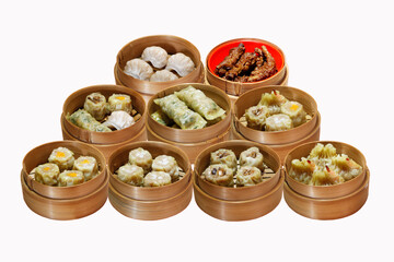 Various types of dim sum in a bamboo container on a white background