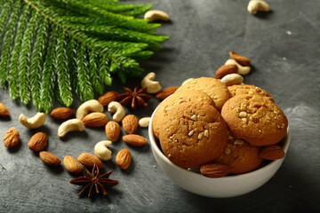 Homemade delicious oven fresh traditional Christmas cookies with cashew nuts and almonds. 