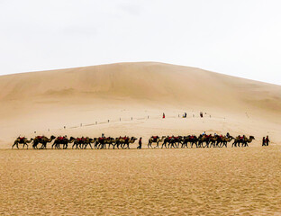 Fototapeta na wymiar The Mingsha Mountain Crescent Spring Scenery in Dunhuang City