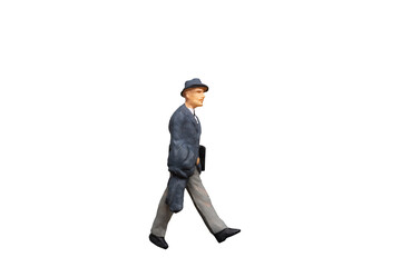 Miniature people businessman standing isolated on white background with clipping path