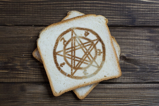 toast with the magic circle sign on dark wood.