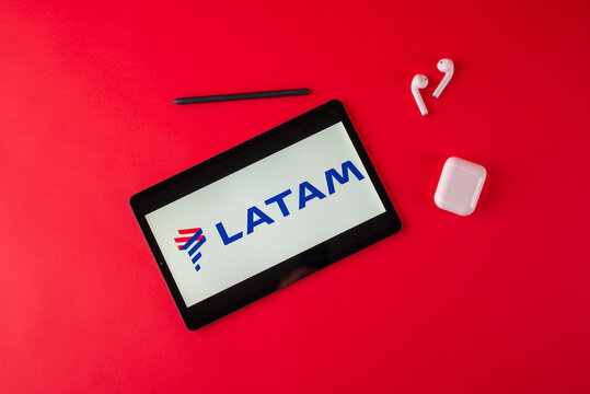 Tula, Russia - October 19, 2021: Latam Airlines Displayed Modern Laptop On Red Background