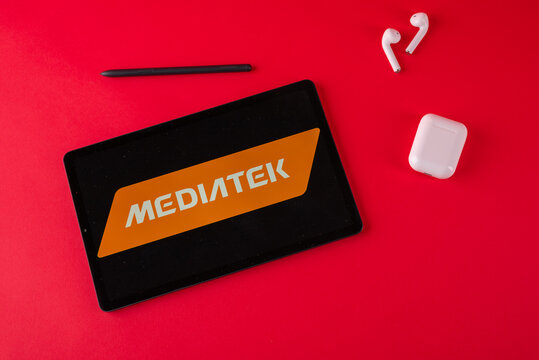 Tula, Russia - october 19, 2021: MediaTek displayed modern laptop on red background