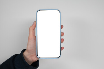 Woman hand holding the black smartphone with blank screen and modern frameless design
