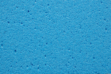 Blue pumice texture, background, macro, close-up, top view. Volcanic pumice stone close-up, background, texture, top view. Porous pumice stone surface, macro, texture, background.