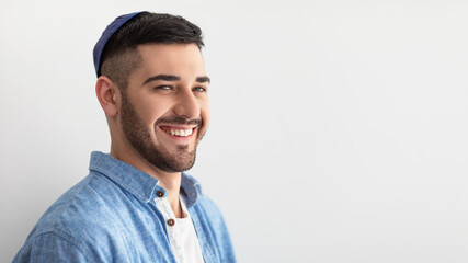 Closeup portrait of smiling jewish man in kippa - obrazy, fototapety, plakaty