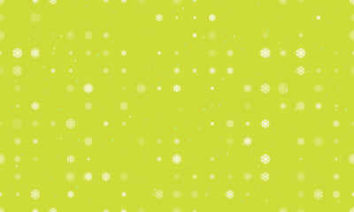 Seamless background pattern of evenly spaced white snowflake symbols of different sizes and opacity. Vector illustration on lime background with stars