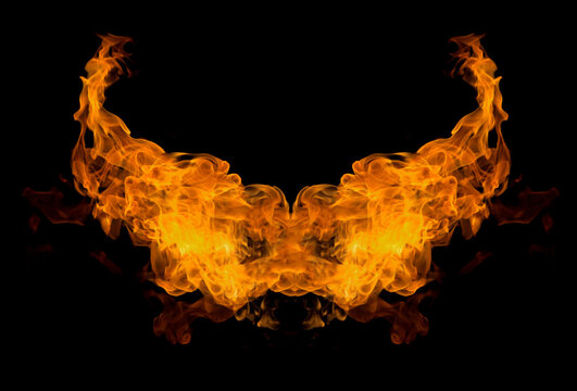 Fire horns on black background. Flaming patterns and abstract smoke. Devil, evil, demon. Concept, idea, project. Burning flame. Blazing fire.