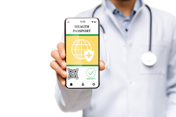 Male medical worker showing smartphone with digital health passport