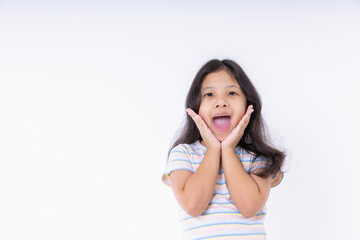 Asian kid girls are very cute smiles very happy, cheerful, bright, positive attitude, Photography standing in a studio with white background and copy space.