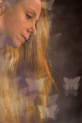 dreamy portrait of a woman with butterflies