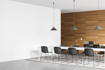 Corner view of meeting room with white and wood walls