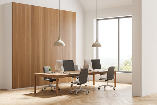 Corner view on bright office room interior with panoramic window