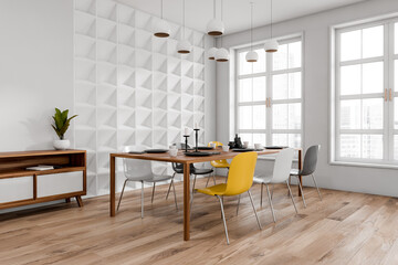 Wooden and white dining interior with six seats, drawer and table near window