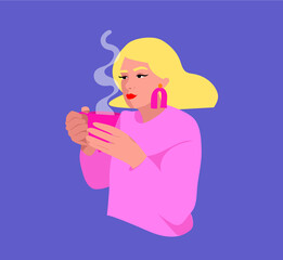 woman having a relaxed moment enjoying her hot cup of tea or coffee