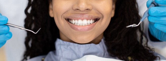 Smiling Black Female Patient Getting Treatment In Stomatologic Clinic, Closeup Shot