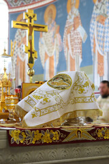    On the throne of the Orthodox Church Prosphora, Prosper and covered with a veil with the image of the Virgin bowl for communion in the Orthodox Church. The concept of Orthodoxy.