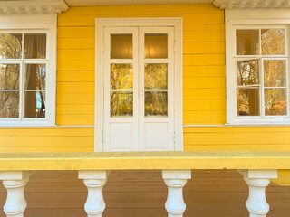 Close up of wooden yellow house