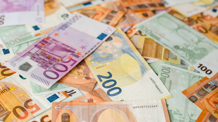 Currency of the European Union, euro banknotes. Various Euro bills as finance concept background image.