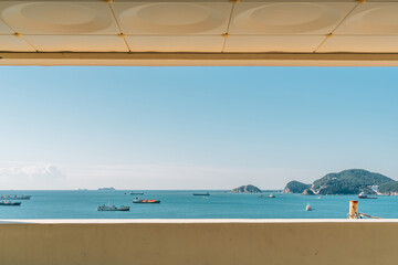 Window frame and view of Huinnyeoul Culture Village sea in Busan, Korea