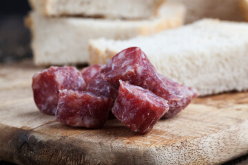 sliced sausage of dried meat with bacon