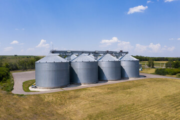 Aerial view of agricultural silos, grain elevator for storage and drying of cereals  © scharfsinn86