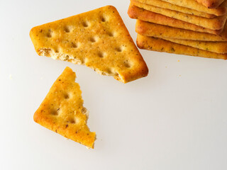 Crushed cracker and crumbs on white background