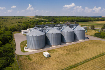 Aerial view of agricultural silos, grain elevator for storage and drying of cereals  © scharfsinn86