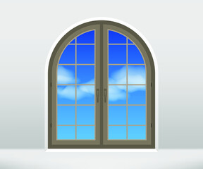 Closed window in the wall. Arched window with view of blue sky. Architecture detail