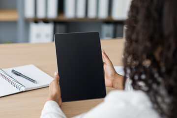Mockup young business woman using smart tech with screen blank on desk, use device internet for working