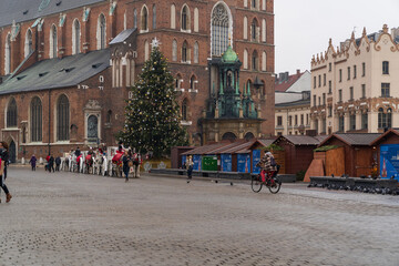 Naklejka premium Krakow, Poland December 15, 2021; Christmas market on the Main Square in the city of Krakow.