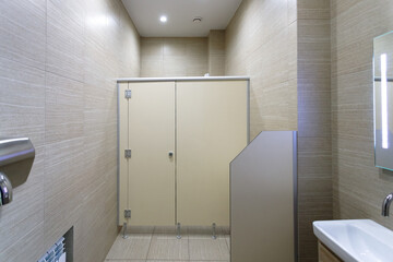 Fototapeta na wymiar Clean new public toilet room empty