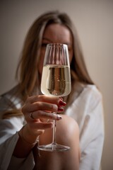 woman with a glass of champagne