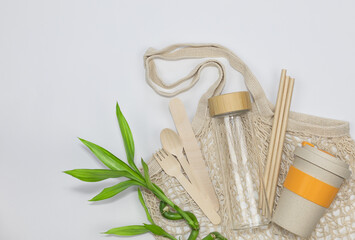 Reusable Cotton Mesh Bag with Glass Bottle, Bamboo Cup, Recycled Tableware.