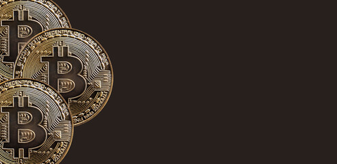 Bitcoins cryptocurrency coins on background with copy space for text. BTC crypto banner.