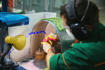 Processing of jade. Industrial jewelry manufacturing. Sacred stone of China