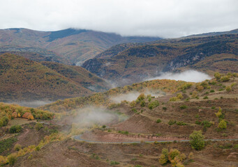 Landscape with mist in the mountains
