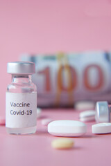 Healthcare cost concept with us dollar, vaccine and pills 