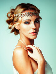 young blond woman dressed like ancient greek godess, gold jewelry close up isolated, beautiful girl...