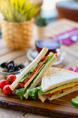 Vegan sandwich with fresh ingredients. Healthy breakfast table. Veggies for healthy meal, vitamin and diet food