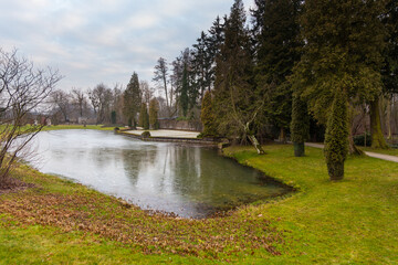 Garden by the Utrata river in Zelazowa Wola, Poland. - obrazy, fototapety, plakaty