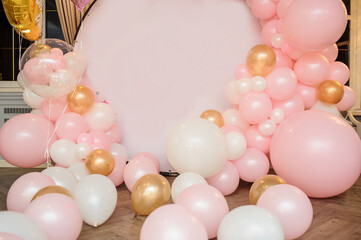 Party photone zone decorated with pink, white, gold ballons.