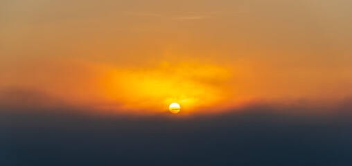Sunrise over the sea of clouds with colorfull sky.
