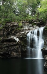 Fototapeta na wymiar Waterfall In The Forest