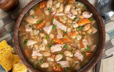 Bowl of ham and been soup