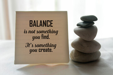 Life balance inspirational quote on notepaper - Balance is not something you find. It is something...