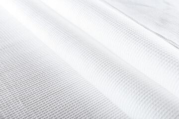 folded white waffle cloth towel fabric