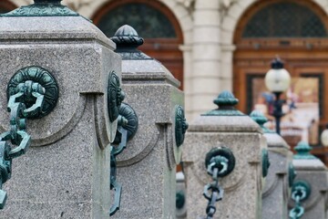 row of decoration pillars with chains